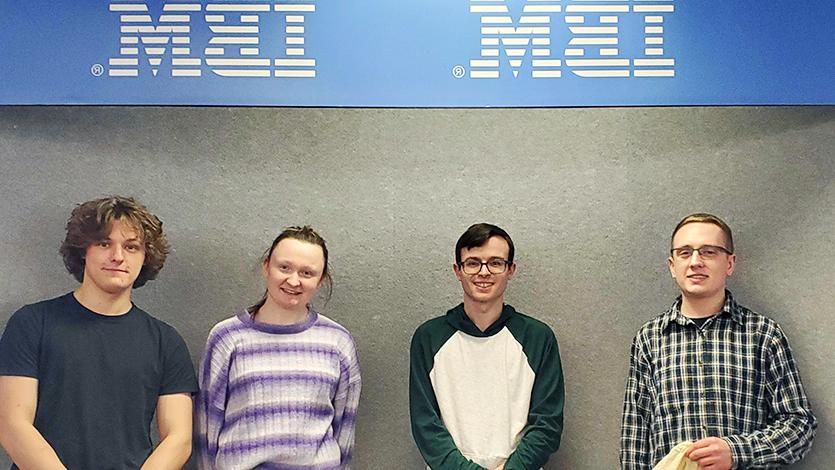 参与该项目的四名Marist/IBM实习生的照片. 从左到右:伊恩·马什24岁，凯尔·库鲁尼斯25岁，莉莲·麦克帕登25岁，埃文·斯皮兰25岁